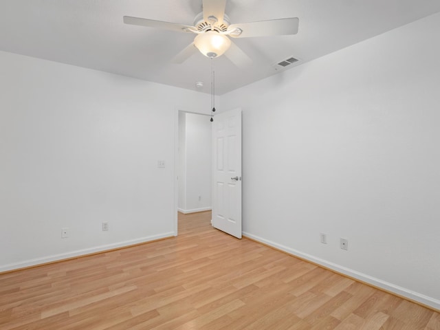 6185 N Milburn Ave, Fresno, CA 93722 - unfurnished room with light wood-style flooring, baseboards, ceiling fan, and a smoke detector