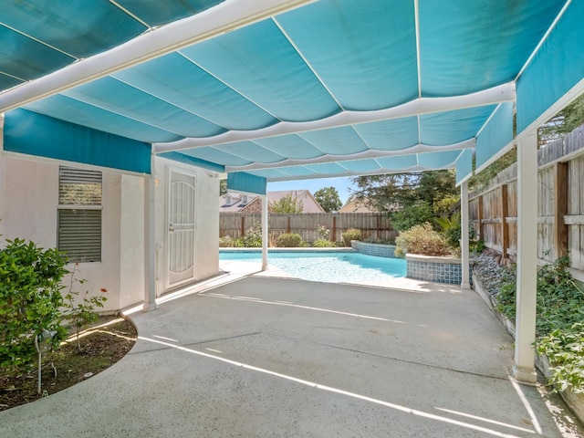 6185 N Milburn Ave, Fresno, CA 93722 - view of pool featuring a fenced backyard and a patio