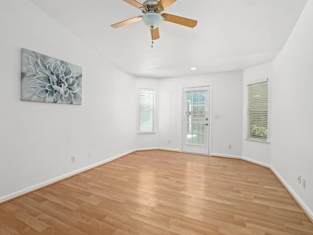 6185 N Milburn Ave, Fresno, CA 93722 - unfurnished room featuring light wood-type flooring, baseboards, a ceiling fan, and recessed lighting