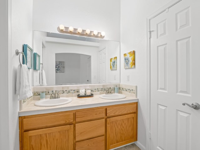 6185 N Milburn Ave, Fresno, CA 93722 - bathroom featuring double vanity