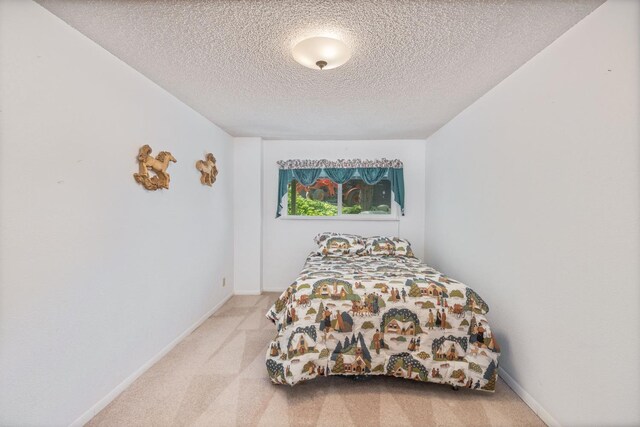 37731 Shoreline Dr, Bass Lake, CA 93604 - carpeted bedroom with a textured ceiling