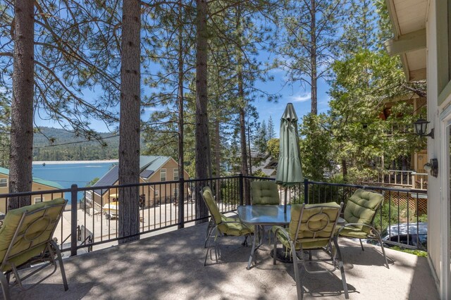 37731 Shoreline Dr, Bass Lake, CA 93604 - wooden deck featuring outdoor dining space