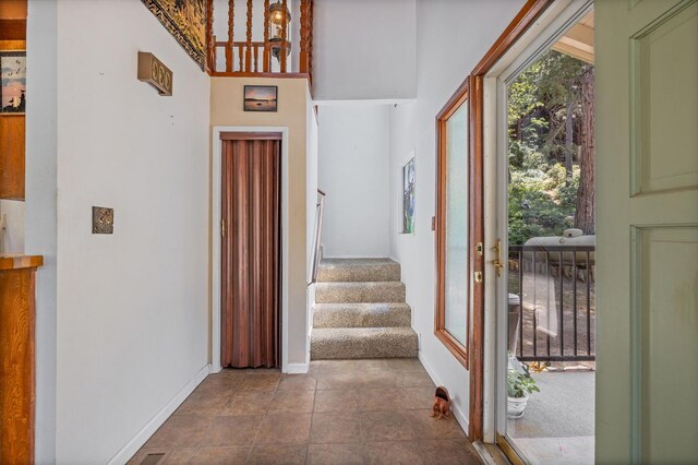 37731 Shoreline Dr, Bass Lake, CA 93604 - entrance foyer with stairway and baseboards