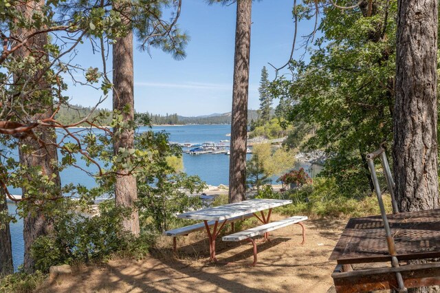 37731 Shoreline Dr, Bass Lake, CA 93604 - water view with a mountain backdrop