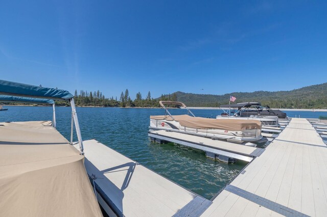37731 Shoreline Dr, Bass Lake, CA 93604 - dock featuring a water and mountain view