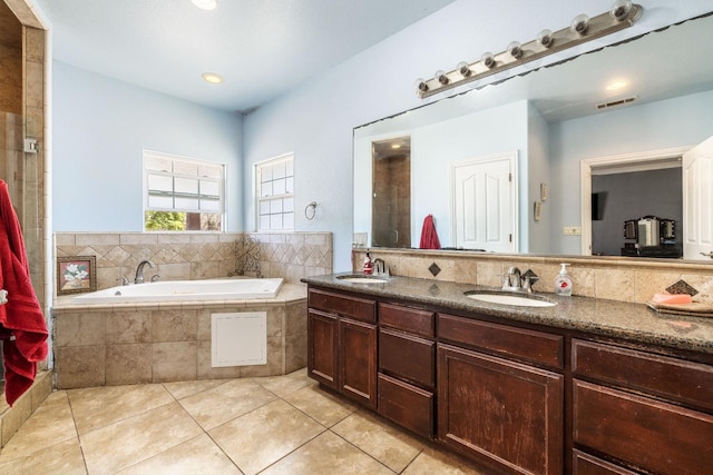 42462 Rd 140, Orosi, CA 93647 - full bath featuring a bath, tile patterned floors, double vanity, and recessed lighting