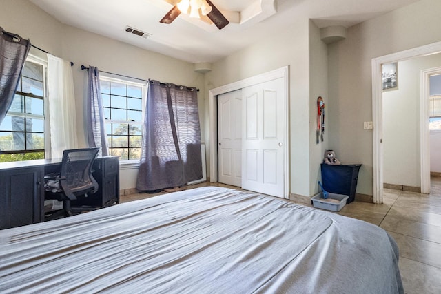 42462 Rd 140, Orosi, CA 93647 - tiled bedroom with a desk, a closet, ceiling fan, and baseboards