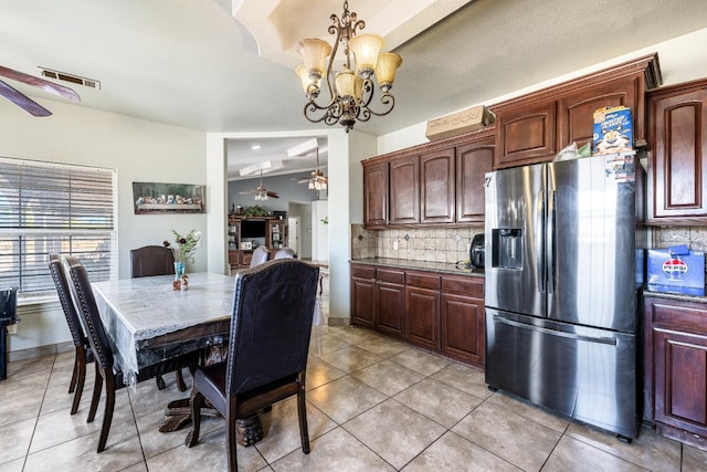 42462 Rd 140, Orosi, CA 93647 - dining room with a ceiling fan, a chandelier, and light tile patterned flooring