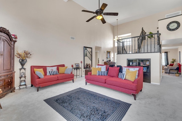 1775 E Cole Ave, Fresno, CA 93720 - living area with carpet floors, high vaulted ceiling, ceiling fan, and baseboards