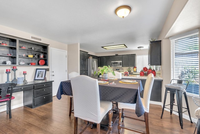 1775 E Cole Ave, Fresno, CA 93720 - dining room featuring wood finished floors and baseboards