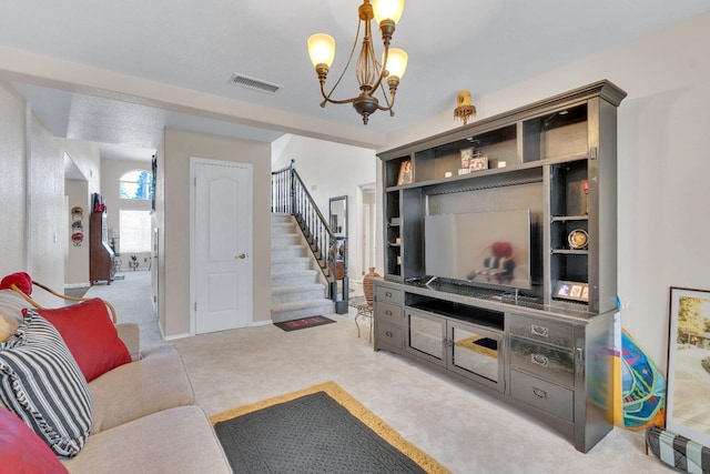 1775 E Cole Ave, Fresno, CA 93720 - living area with carpet, a chandelier, stairway, and baseboards