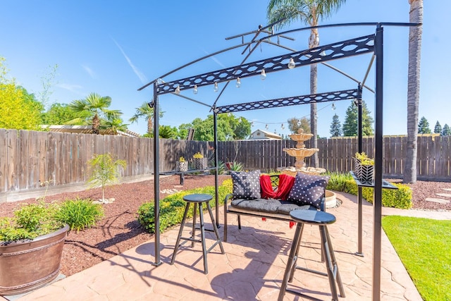 1775 E Cole Ave, Fresno, CA 93720 - fenced backyard featuring a patio