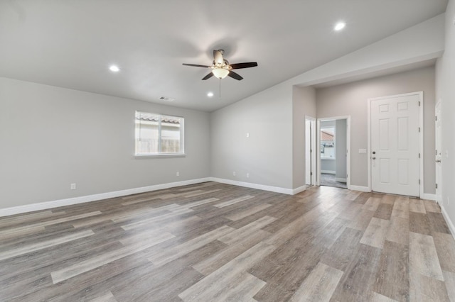 1061 Adell St, Madera, CA 93638 - spare room featuring ceiling fan, vaulted ceiling, light wood finished floors, recessed lighting, and baseboards