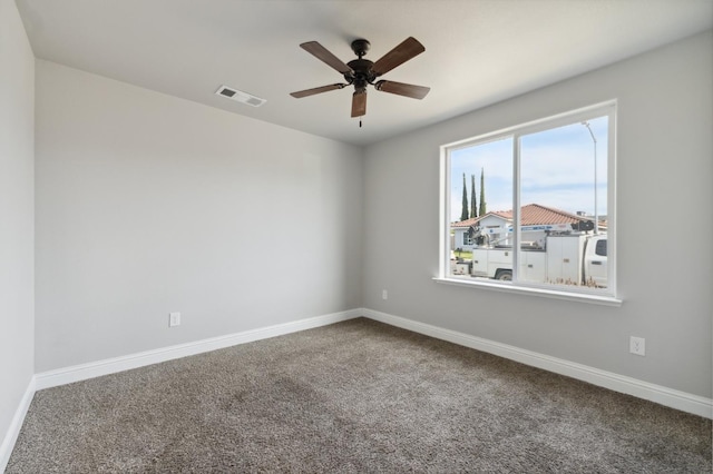 1061 Adell St, Madera, CA 93638 - carpeted empty room with a ceiling fan and baseboards