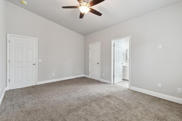1061 Adell St, Madera, CA 93638 - unfurnished bedroom with carpet floors, baseboards, ensuite bathroom, and a ceiling fan