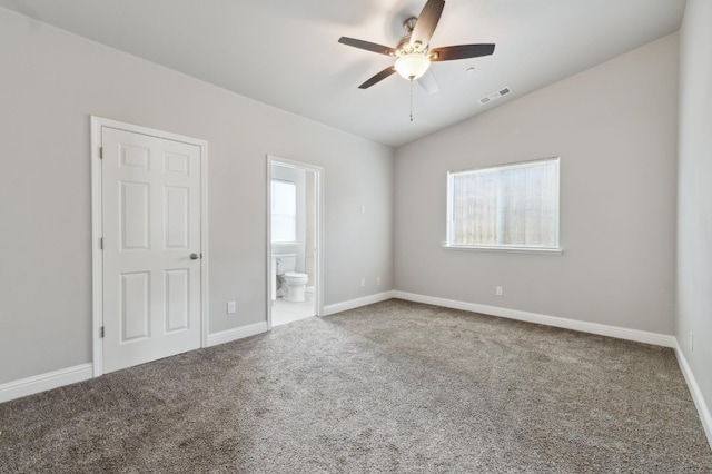 1061 Adell St, Madera, CA 93638 - carpeted spare room with ceiling fan, vaulted ceiling, and baseboards