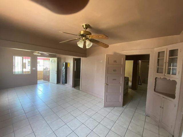 1325 S 4th St, Fresno, CA 93702 - spare room with ceiling fan and light tile patterned floors