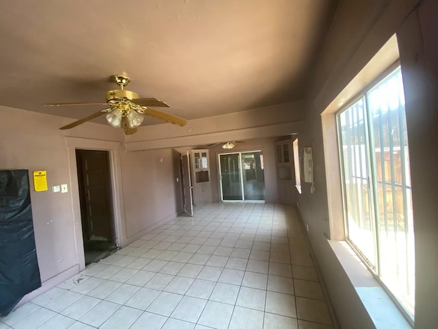 1325 S 4th St, Fresno, CA 93702 - empty room with ceiling fan and light tile patterned floors
