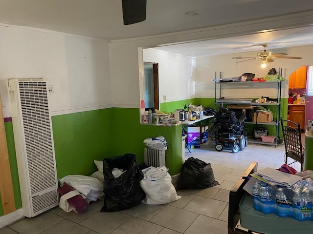 1425 S 3rd St, Fresno, CA 93702 - bedroom with a heating unit, tile patterned flooring, wainscoting, and ceiling fan