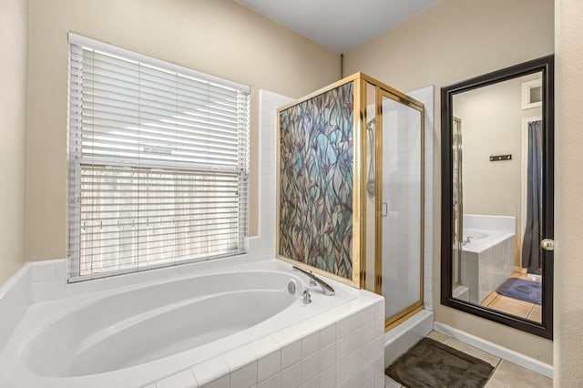 10033 N Baird Ave, Fresno, CA 93730 - full bath with a garden tub, a shower stall, and tile patterned floors