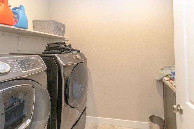 116 Meridian Ave, Madera, CA 93636 - laundry area with separate washer and dryer and baseboards