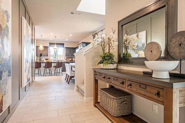 1157 Maclure Ave W, Madera, CA 93636 - corridor featuring recessed lighting and light tile patterned floors