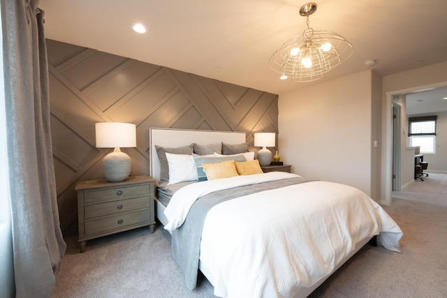 1157 Maclure Ave W, Madera, CA 93636 - bedroom with light carpet, a chandelier, a decorative wall, and recessed lighting