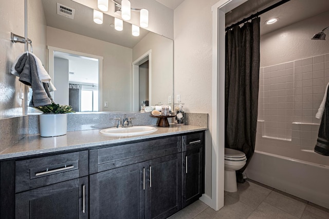 1157 Maclure Ave W, Madera, CA 93636 - bathroom with vanity, toilet, shower / tub combo, and tile patterned flooring