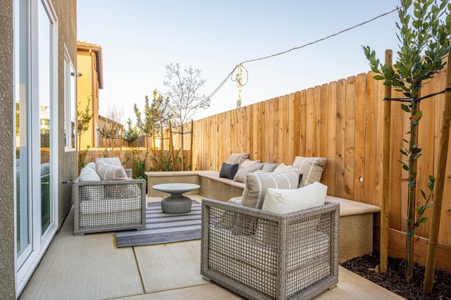 1157 Maclure Ave W, Madera, CA 93636 - fenced backyard with outdoor lounge area and a patio area