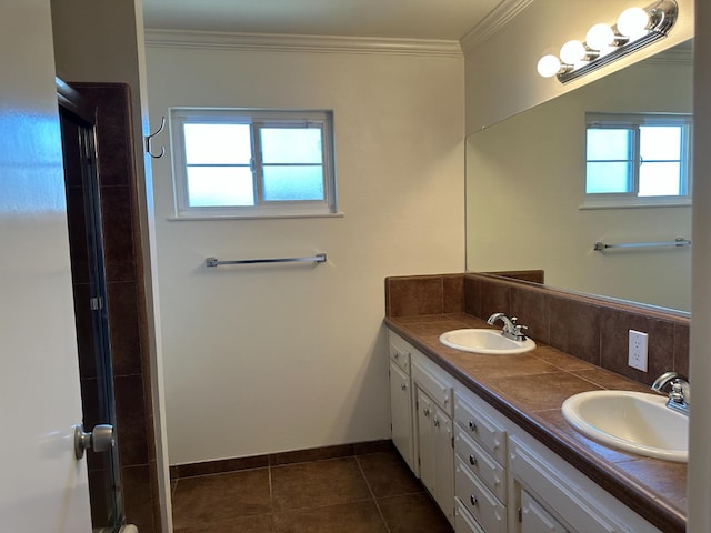 6538 N 4th St, Fresno, CA 93710 - full bath with double vanity, tile patterned flooring, crown molding, and a shower with shower door