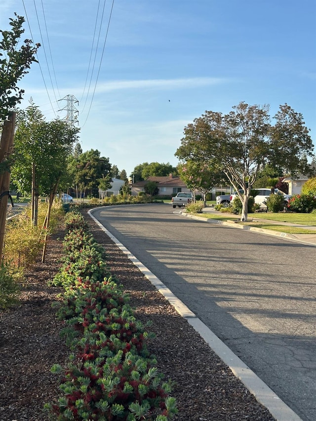 6538 N 4th St, Fresno, CA 93710 - view of asphalt road with curbs