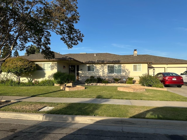 6538 N 4th St, Fresno, CA 93710 - ranch-style house featuring a garage, a front lawn, a chimney, and brick siding