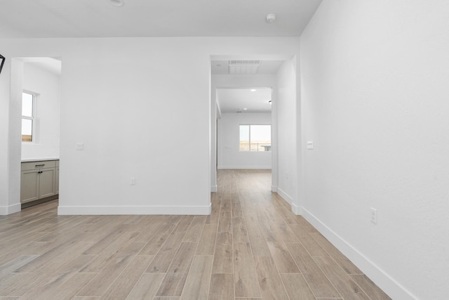 8152 Creek Vw, Friant, CA 93626 - empty room featuring light wood-style floors and a smoke detector
