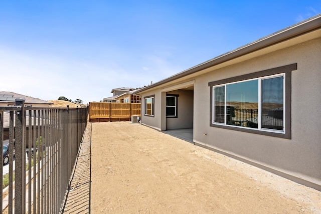 8152 Creek Vw, Friant, CA 93626 - fenced backyard featuring a patio area
