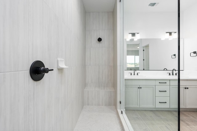 8152 Creek Vw, Friant, CA 93626 - bathroom featuring tiled shower and double vanity