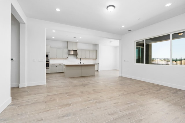 8152 Creek Vw, Friant, CA 93626 - unfurnished living room featuring light wood-style floors and recessed lighting