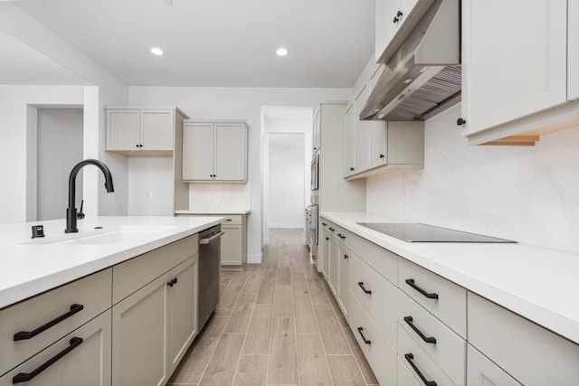 8152 Creek Vw, Friant, CA 93626 - kitchen with extractor fan, appliances with stainless steel finishes, light countertops, light wood-type flooring, and recessed lighting