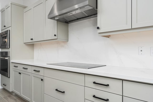 8152 Creek Vw, Friant, CA 93626 - kitchen featuring wall chimney exhaust hood, appliances with stainless steel finishes, and light countertops