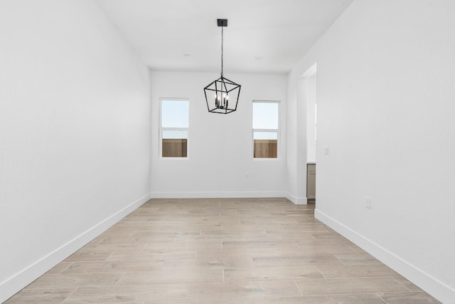 8152 Creek Vw, Friant, CA 93626 - unfurnished dining area featuring a chandelier and light wood finished floors