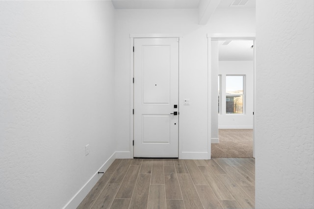 8152 Creek Vw, Friant, CA 93626 - corridor featuring wood finished floors and a textured wall