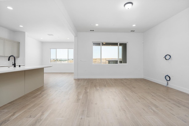 8152 Creek Vw, Friant, CA 93626 - unfurnished living room featuring light wood finished floors and recessed lighting