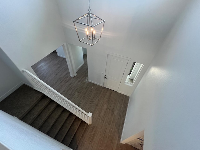 8131 Creek Vw, Friant, CA 93626 - foyer entrance with wood finished floors, a chandelier, and baseboards