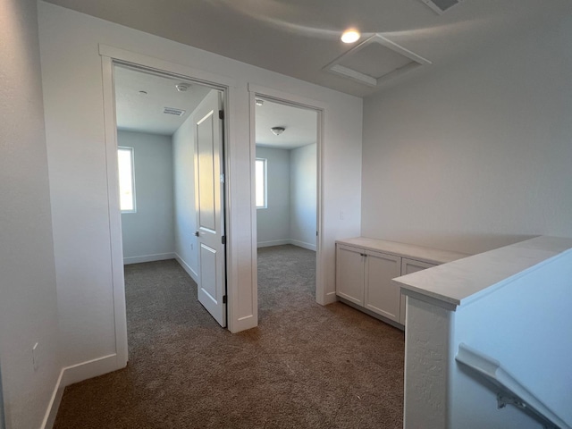 8131 Creek Vw, Friant, CA 93626 - corridor featuring carpet floors, attic access, and baseboards
