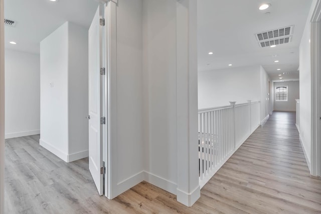 1734 Lester Ave, Clovis, CA 93619 - corridor featuring light wood finished floors, baseboards, and recessed lighting