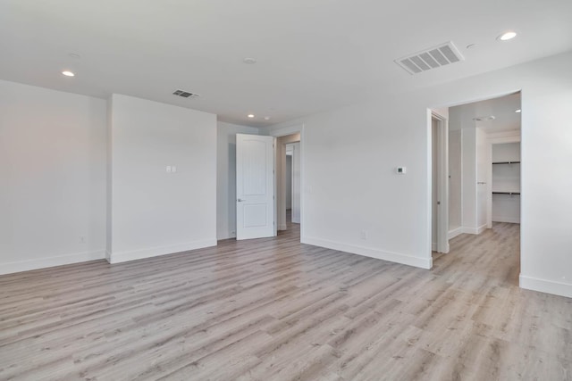 1734 Lester Ave, Clovis, CA 93619 - unfurnished room featuring recessed lighting, light wood-style floors, and baseboards