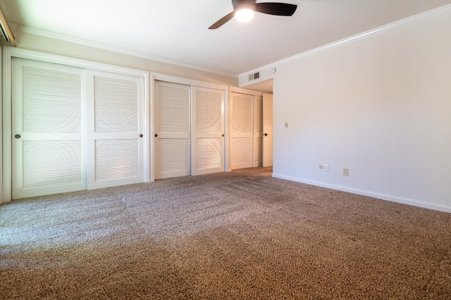 1785 W Calimyrna Ave Unit A, Fresno, CA 93711 - unfurnished bedroom featuring crown molding, multiple closets, carpet, baseboards, and ceiling fan