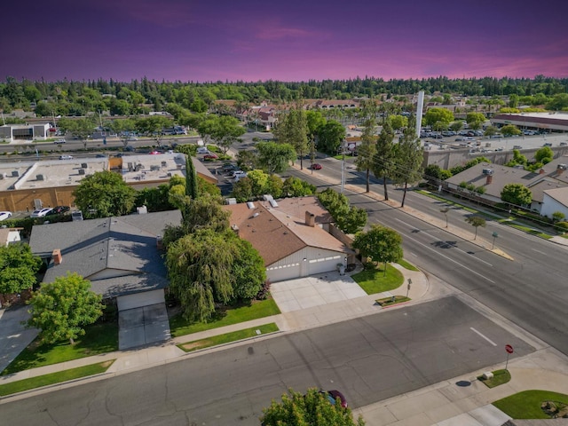 1785 W Calimyrna Ave Unit A, Fresno, CA 93711 - aerial view at dusk of a residential view