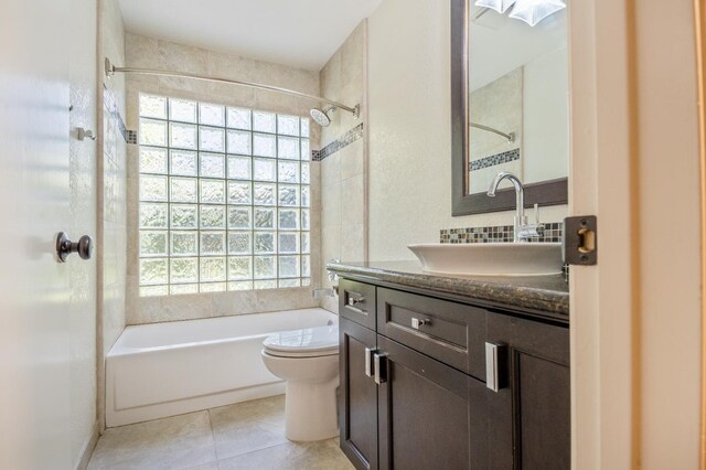 1785 W Calimyrna Ave Unit A, Fresno, CA 93711 - full bathroom with shower / bath combination, vanity, toilet, tile patterned floors, and tasteful backsplash