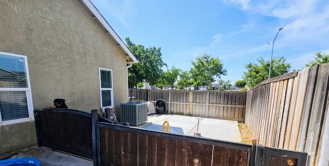 5453 N San Clemente Ave, Fresno, CA 93723 - fenced backyard with cooling unit and a patio area