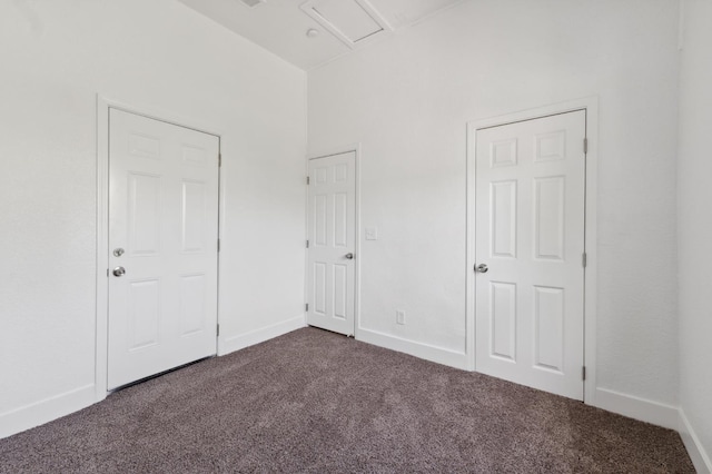 630 N Roosevelt Ave, Fresno, CA 93728 - unfurnished bedroom featuring dark carpet and baseboards